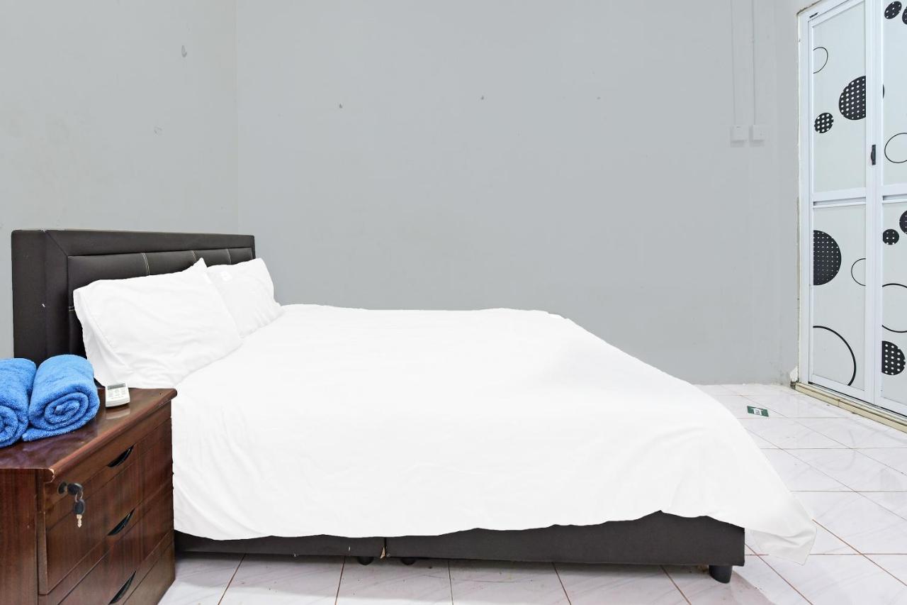 Oyo 90596 Casaria Inn Paka Εξωτερικό φωτογραφία